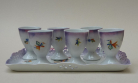 Art Deco lusterware porseleinen eierdopjes op schaal