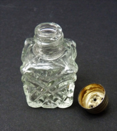 Miniature pressed glass salt shaker silver plated cap