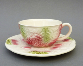 Salins Les Bains barbotine cup with saucer decorated with fruit