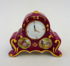 Limoges porcelain miniature burgundy mantel clock in Fragonard style