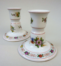 A pair of antique Schierholz Plaue porcelain candlesticks