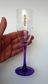 A pair of crystal Piper Heidsieck purple stem champagne flutes