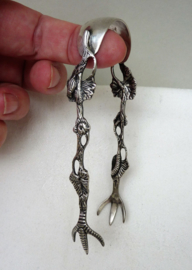 Silver plated reticulated sugar tongs with bird claws