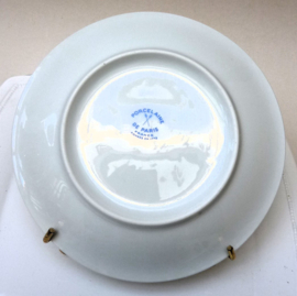 Porcelaine de Paris saladeborden in metalen draadmand