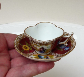 A pair of Dresden miniature quatrefoil cups 19th century