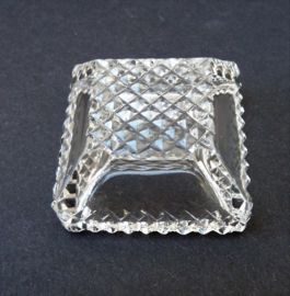 A pair of square cut crystal salt cellars