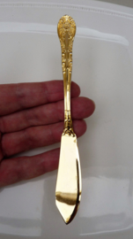 Vintage gold plated butter knife