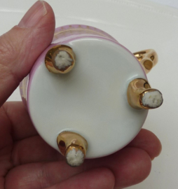 Gilded pink porcelain footed cabinet cup