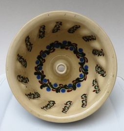 Faience pottery pudding mold