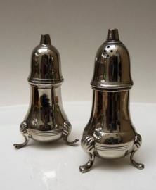 A pair of silver plated salt and pepper shakers