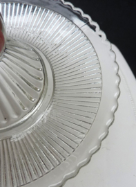 A pair of pressed glass chambersticks 1930s