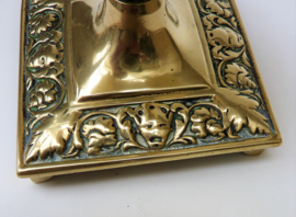 A pair of Victorian brass candlesticks