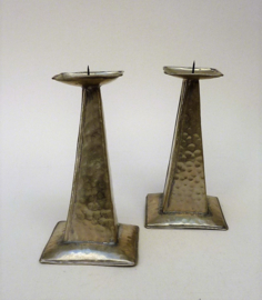 A pair of silver plated Amsterdamse School candlesticks