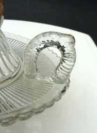 A pair of pressed glass chambersticks 1930s