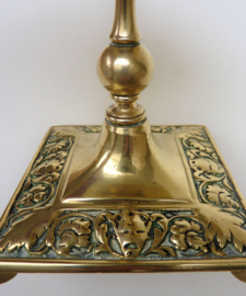 A pair of Victorian brass candlesticks