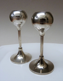 A pair of silver plated Space Age candlesticks