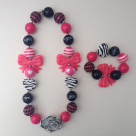 Kralenarmband Girly for girls met roze strik