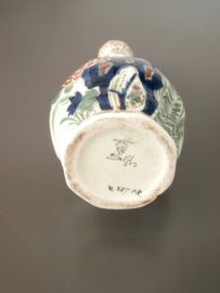 1920, Achtkantig flesje,'De Porceleyne Fles', gekleurd.