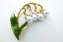 Broche lelie-tje van Dalen.