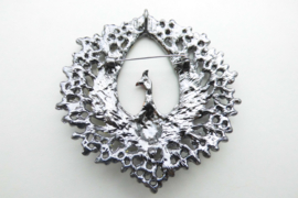 Broche phoenix pauw.