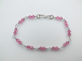 Zilveren roze kralen bracelet.