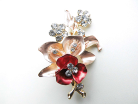 Broche rood/roze bloem.