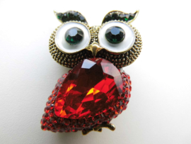 Broche rode uil.