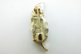 Broche veer met steentjes.