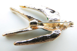 Broche zwaluw.