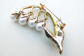 Broche lelie-tje van Dalen.