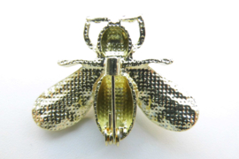 Broche bij met grijze synth. parel.