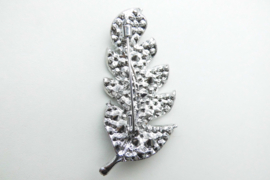 Broche blad.