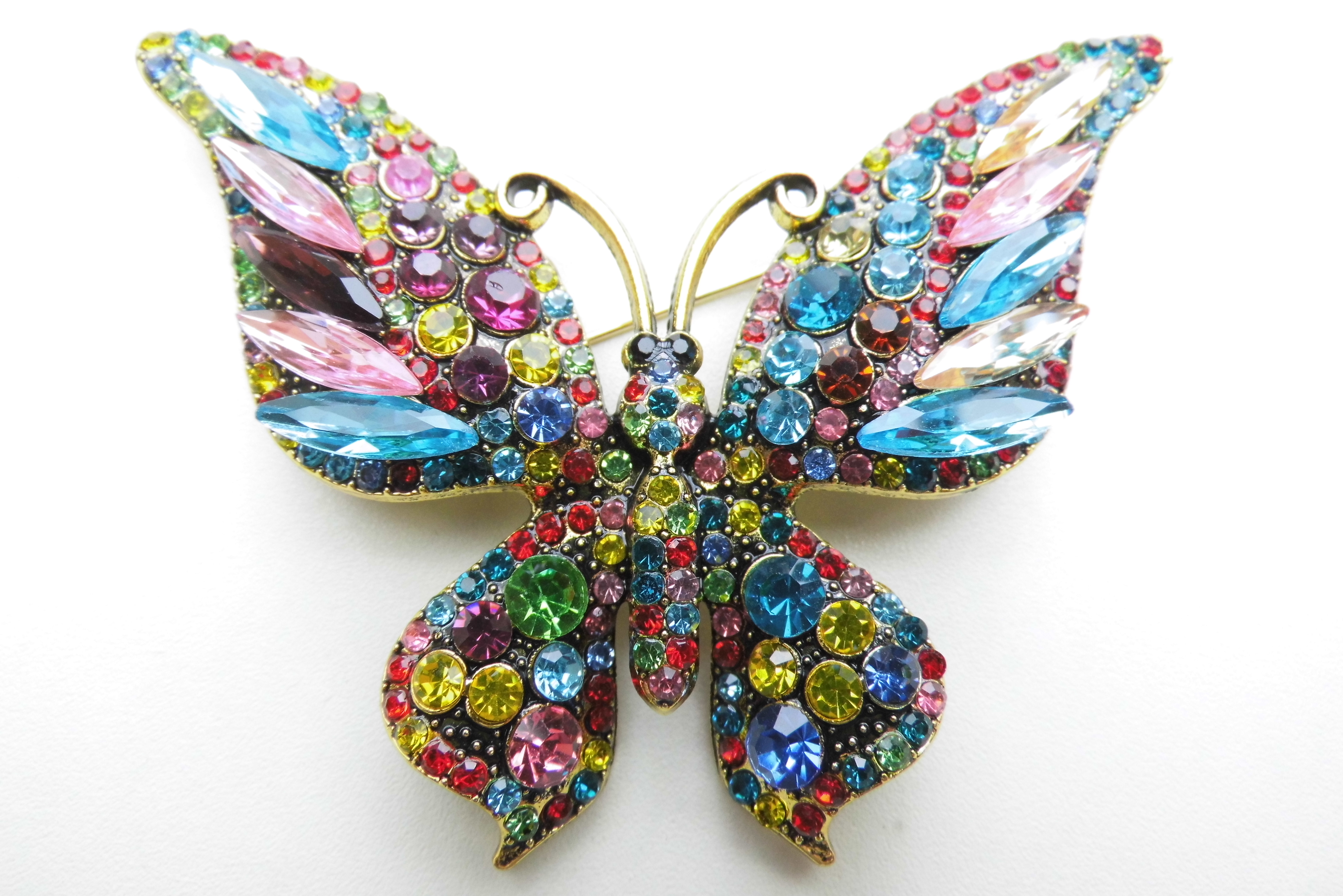 Broche grote kleurrijke vlinder.