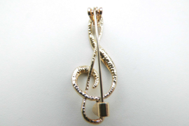 Broche muziek sleutel zwart.