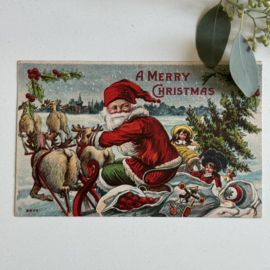 Kerstman op arreslee