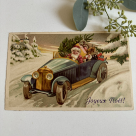 Kerstman in auto