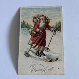 Kerstman op ski's