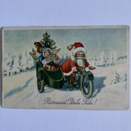 Kerstman op motor