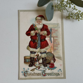 Kerstman vult sok