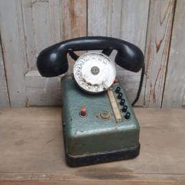 Oude telefoon van het merk "Telic"
