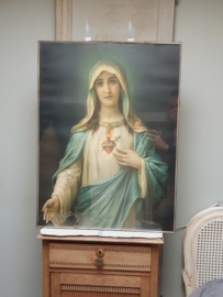 Oude plaat van Maria achter glasplaat