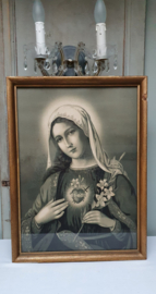 Prachtige Maria achter glas