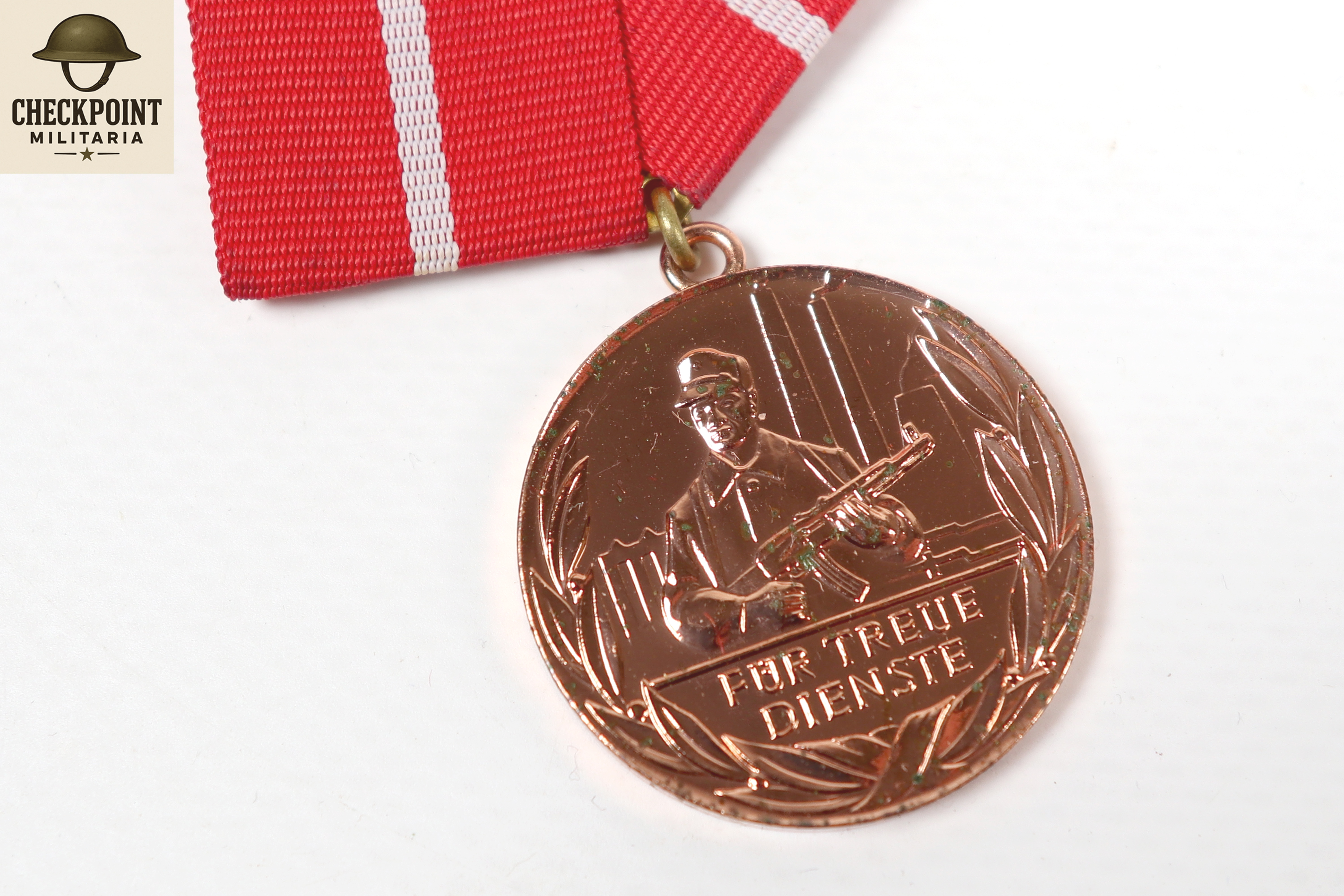 Médaille de la RDA pour services loyaux dans les groupes de combat - bronze.