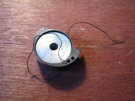 Bobbin case with bobbin for our Basic machine