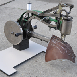 Leather sewing machine for left and right hand use
