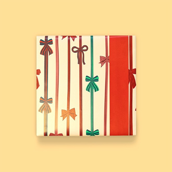 Dubbelzijdig kerstpapier strikjes
