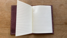 noteboek rood bruin