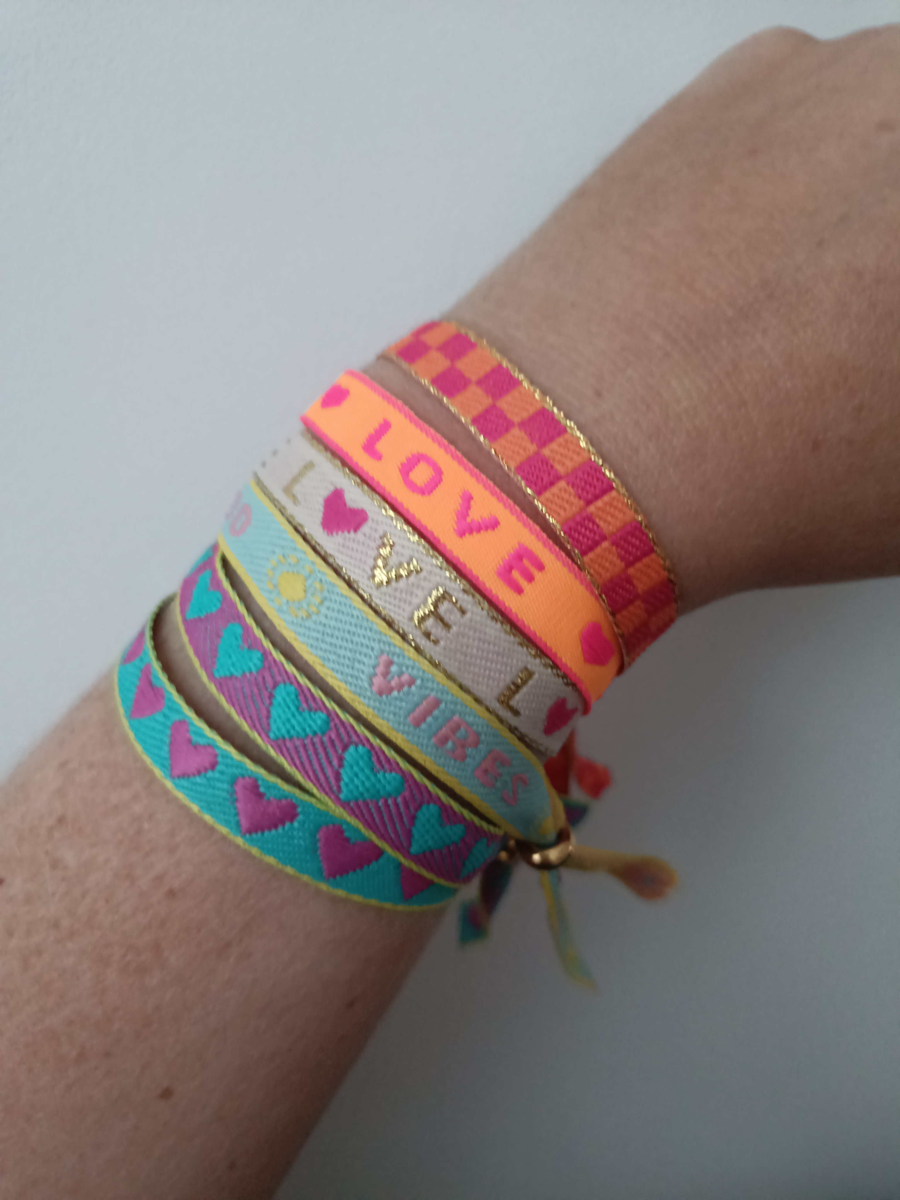 Lint armbandje "cubes" orange-pink