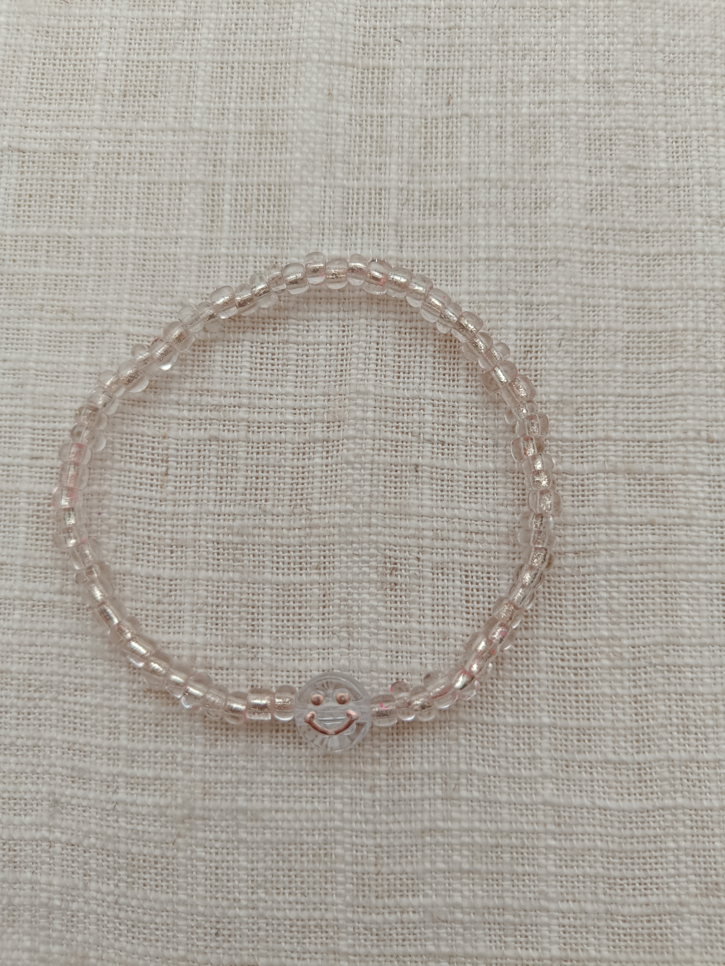 Armbandje - smiley light