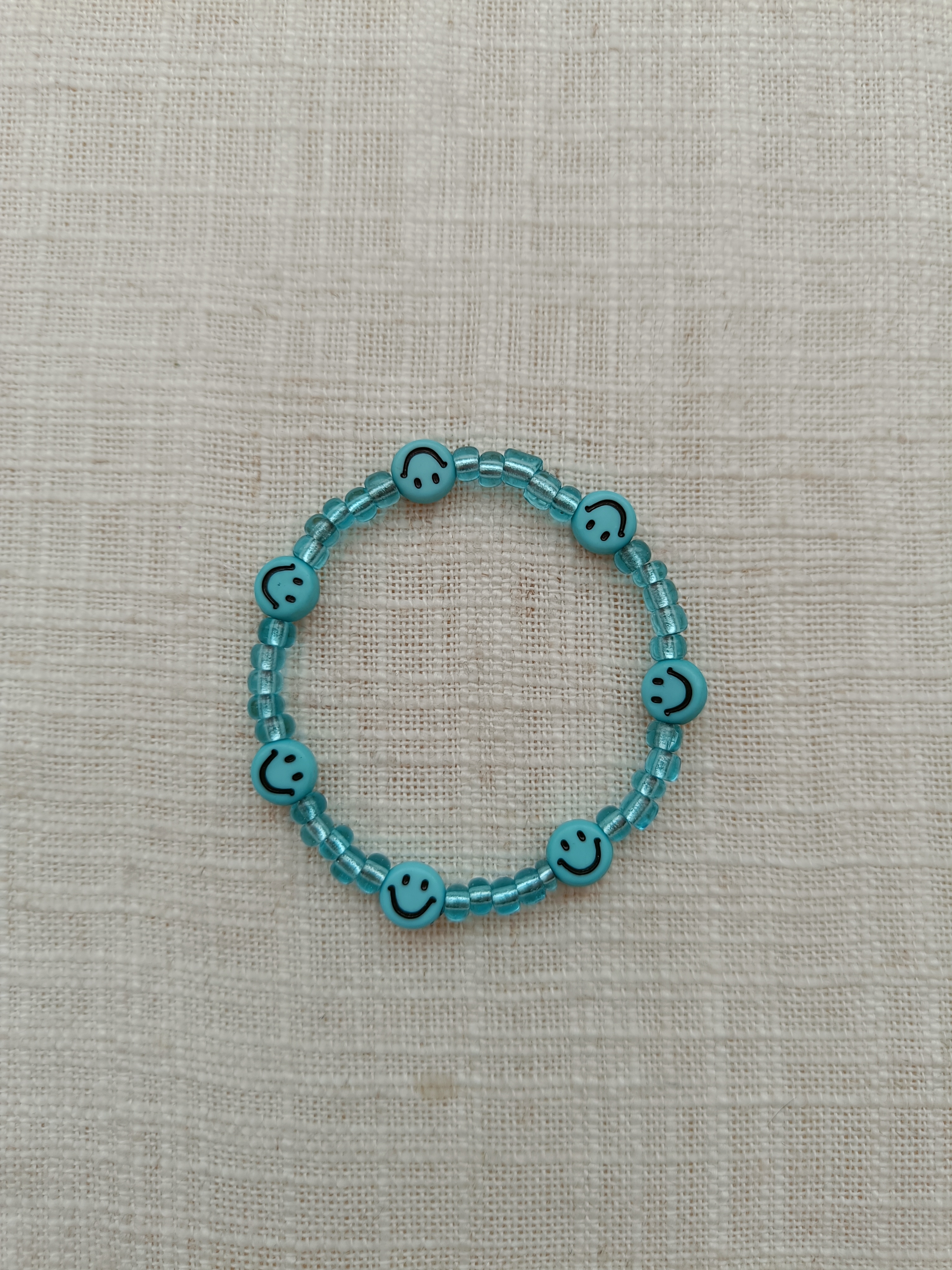 Armbandje - smileys blauw